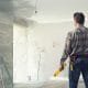 Handyman remodeling a room.